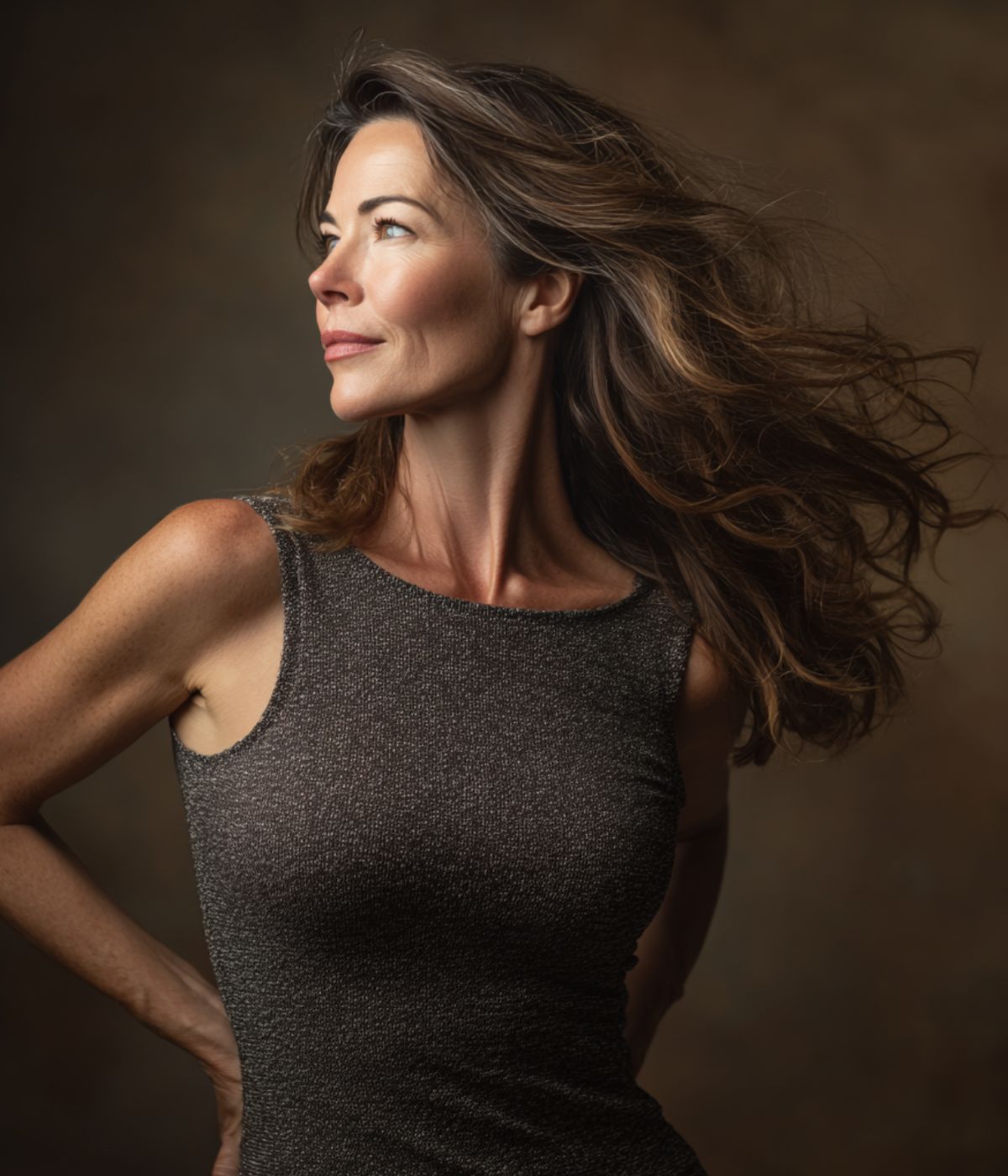 A woman in her fifties, healthy and at ease